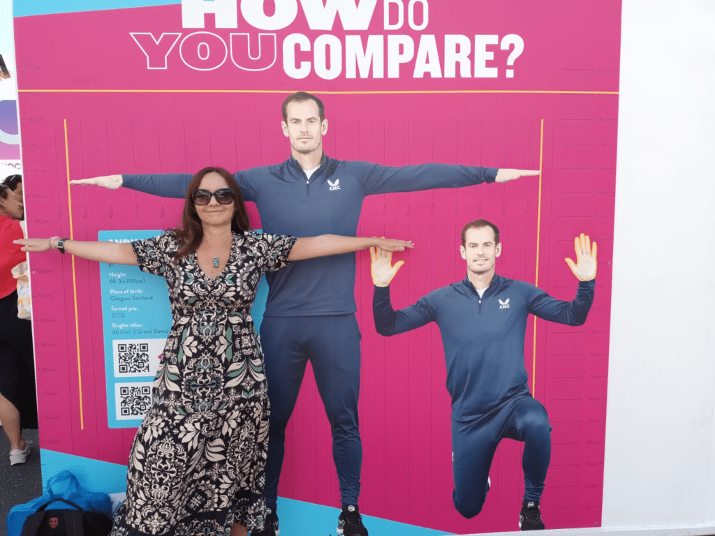 Marianne standing next to an actual-size poster of Andy Murray.